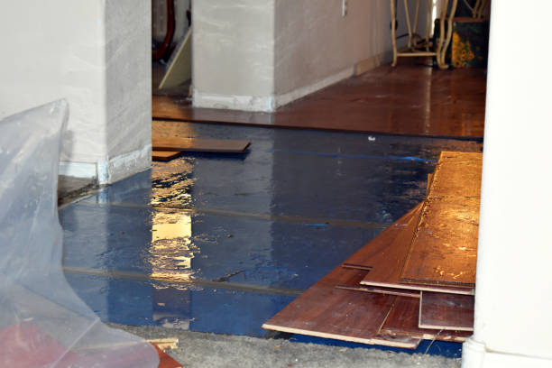 Professional Emergency Water Damage Restoration technician working in West Yarmouth, MA